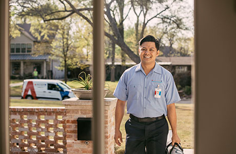 Aire Serv HVAC repair technician arriving at home to perform HVAC service