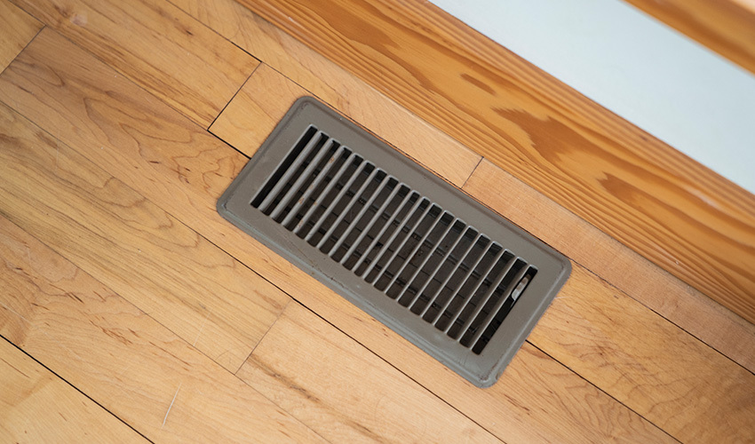 Closed air vent in hardwood floor